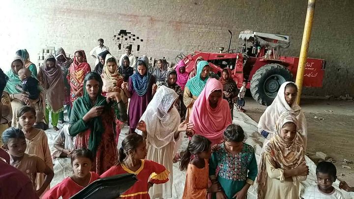 A photograph sent from the ministry in Pakistan: children and families gathered outdoors