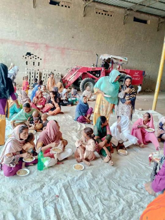 A photograph sent from the ministry in Pakistan: children and families gathered outdoors